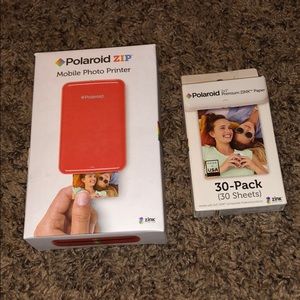 Polaroid zip mobile photo printer with paper.